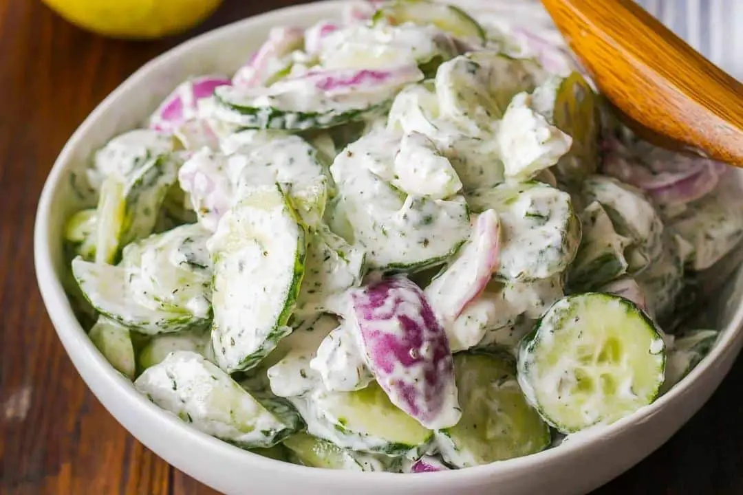 This Creamy Cucumber Salad is a refreshing side dish, perfect for summer or any meal. With crisp cucumbers, tangy sour cream dressing, and a hint of garlic and dill, it's both light and flavorful. Simple to prepare, this salad is ideal for barbecues, potlucks, or a quick weekday side.