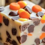 This Butterfinger Reese’s Fudge is a sweet and creamy treat packed with crunchy Butterfinger bits and mini Reese’s Pieces. Perfect for satisfying your sweet tooth, it’s an easy dessert that’s sure to be a crowd-pleaser for any occasion.